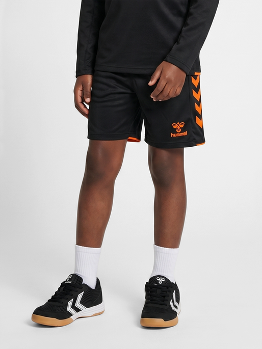 hmlCORE 2.0 SHORTS KIDS, BLACK/ORANGE TIGER, model