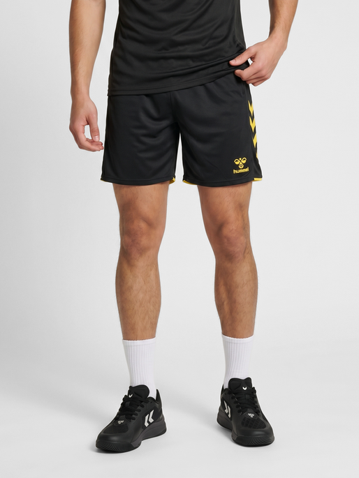 hmlCORE 2.0 SHORTS, BLACK/BLAZING YELLOW, model