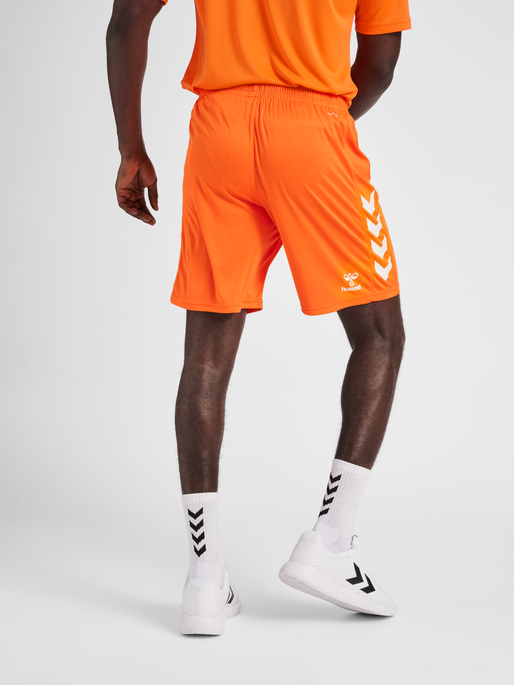 hmlCORE XK POLY SHORTS, ORANGE TIGER, model