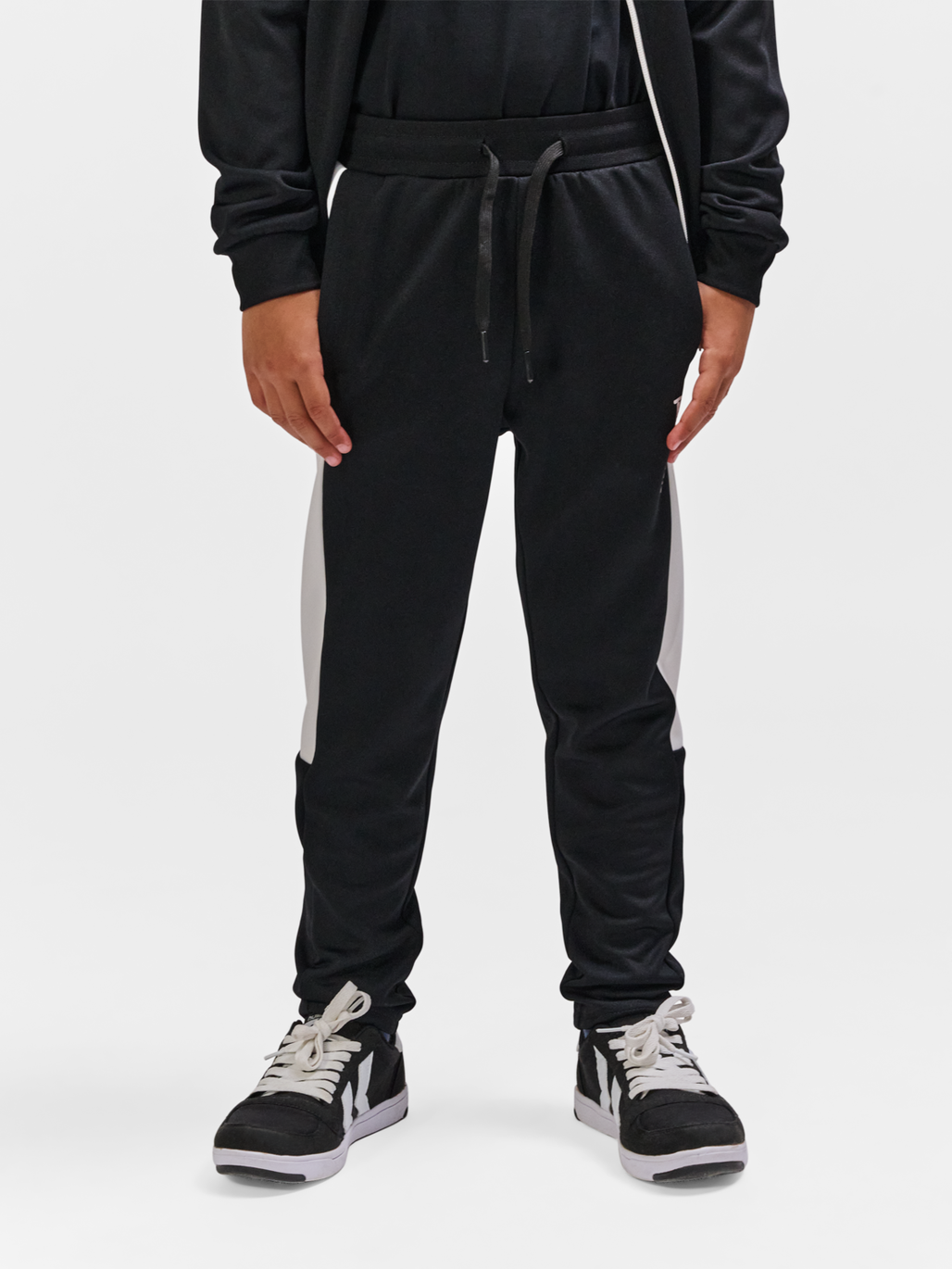 hmlRUNNER PANTS, BLACK, model