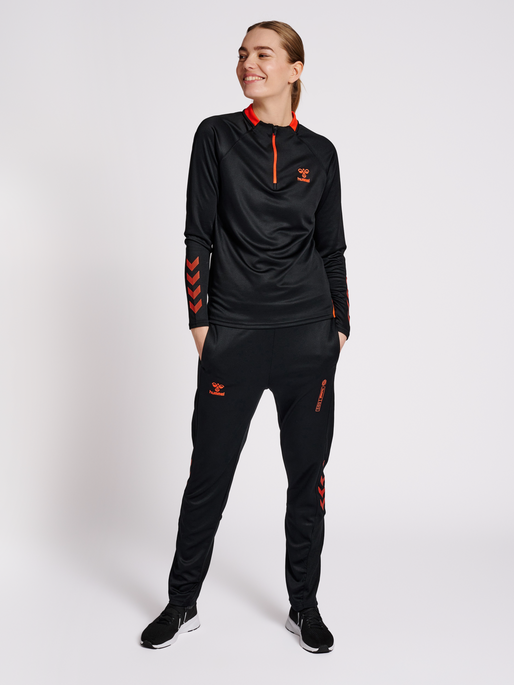 hmlGG12 ACTION HALF ZIP SWEAT WOMAN, BLACK/CHERRY TOMATO, model