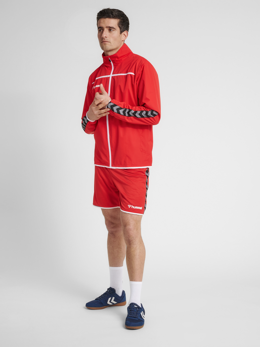 hmlAUTHENTIC TRAINING JACKET, TRUE RED, model