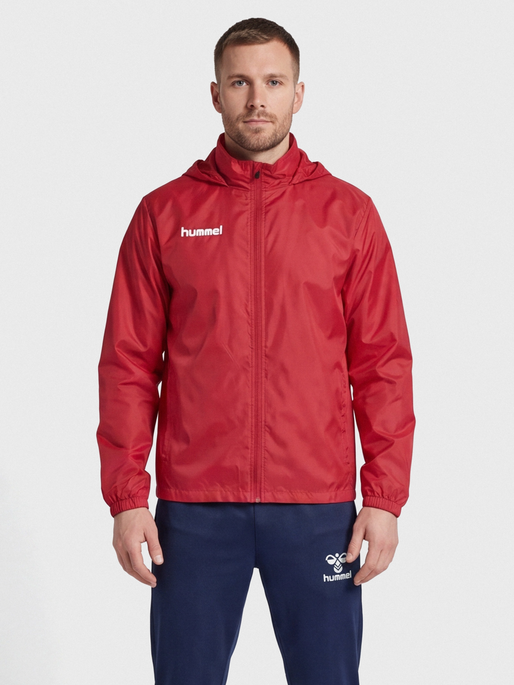 hmlPROMO RAIN JACKET, TRUE RED, model