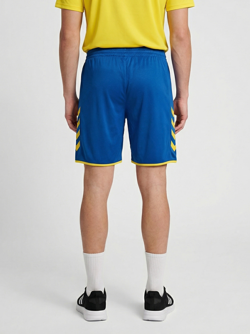 hmlCORE 2.0 SHORTS, TRUE BLUE/BLAZING YELLOW, model
