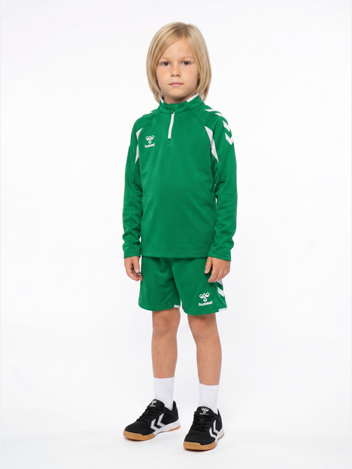 hmlCORE 2.0 SHORTS KIDS, JELLY BEAN/WHITE, model