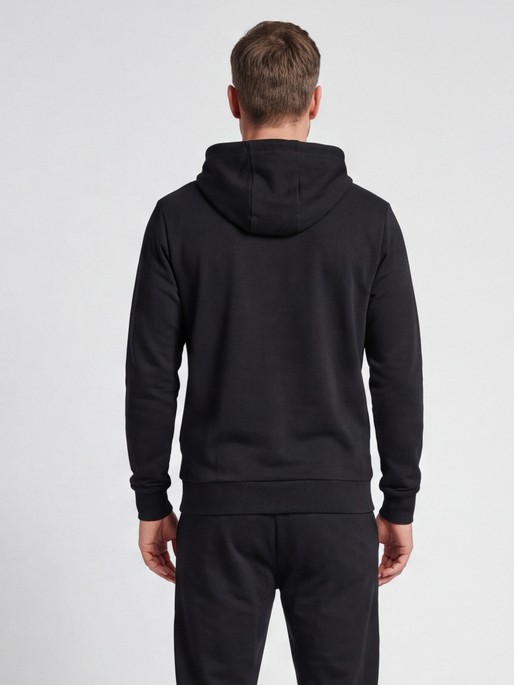 hmlGO 2.0 LOGO HOODIE, BLACK, model